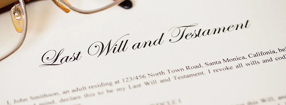 Last will and testament with pen and glasses concept