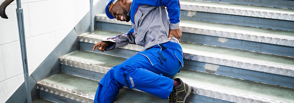 Worker Man Lying On Staircase