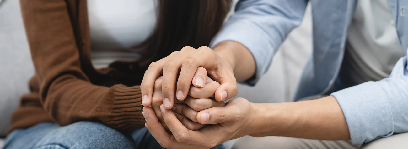 Lost a Loved One - holding hands
